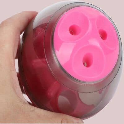 jouet interactif rose vue du dessus.